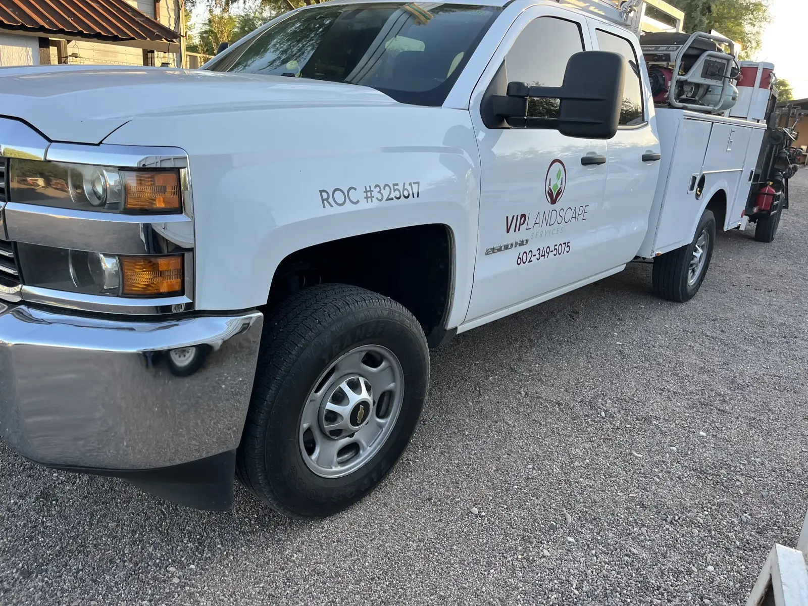VIP Landscape branded service truck onsite at a project location.